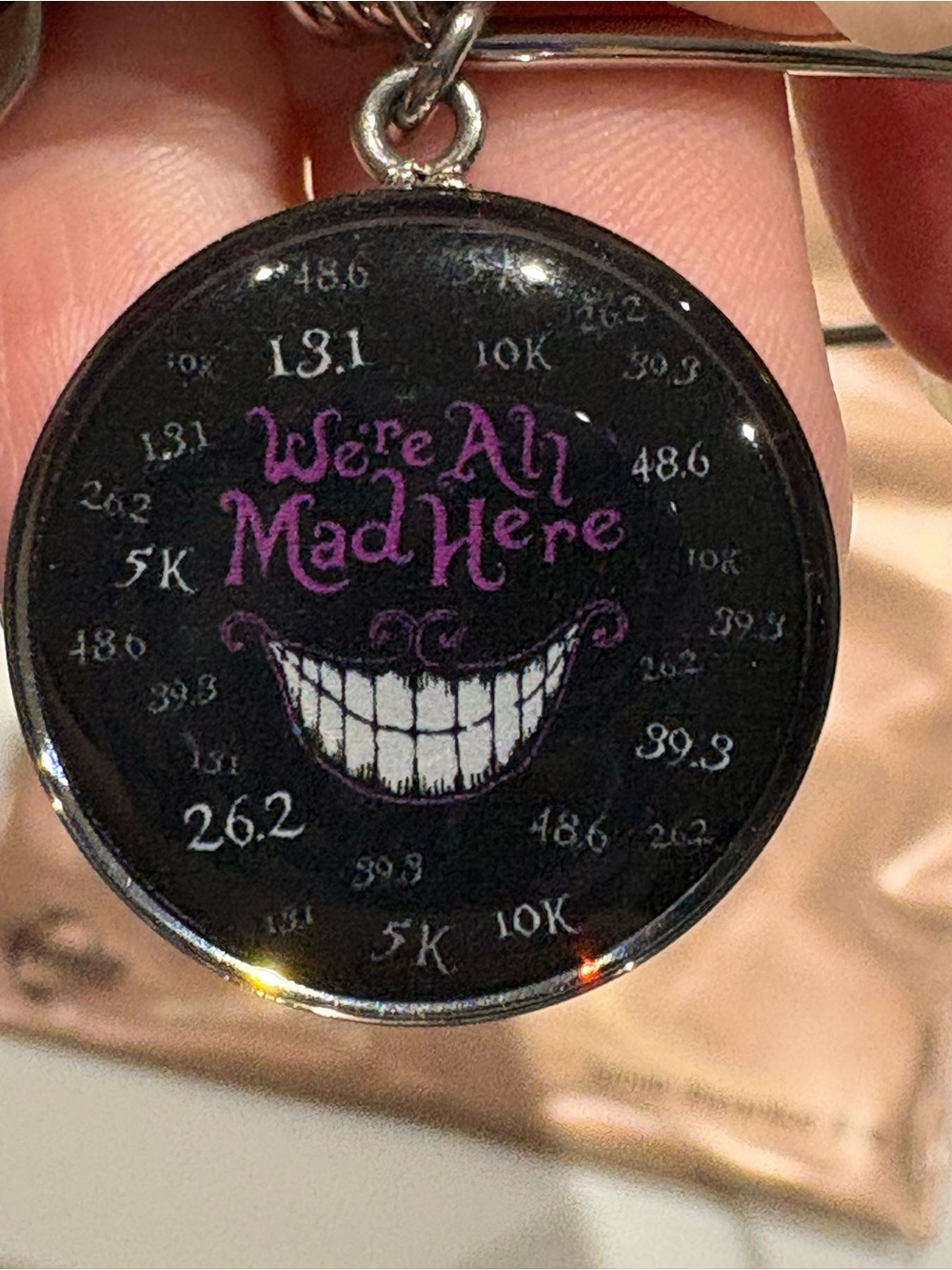 Runners "We're All Mad Here" Cheshire Smile Pendant